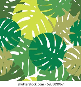 Seamless vector background with decorative leaves. Palm leaves.
