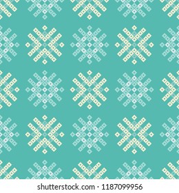 Seamless vector background with decorative snowflakes. Winter pattern. Can be used for wallpaper, textile, invitation card, wrapping, web page background.