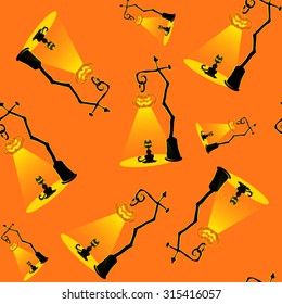 Seamless vector background with design elements: halloween pumpkin lamps and black cat isolated on orange background