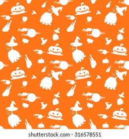 Seamless vector background with design elements: halloween pumpkins, candles, cauldron and moon isolated on orange background