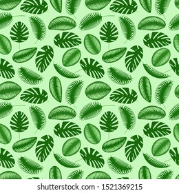  Seamless vector background of different tropical leaves on green background