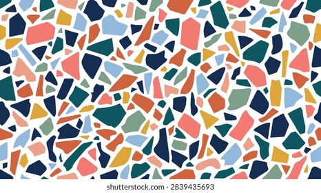 Seamless vector background featuring bright multi colored geometric rock fragments in trendy terrazzo floor design style