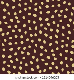 Seamless vector background with golden random elements. Abstract ornament. Dotted abstract brown and golden pattern