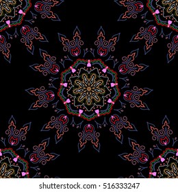 Seamless vector background. Graphic modern pattern. Pink, green and violet texture on black background. Abstract pattern in Arabian style.