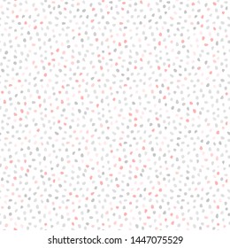 Seamless vector background with gray and pink random elements. Abstract ornament. Dotted abstract pattern