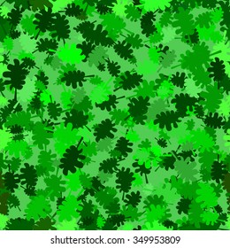 Seamless vector background with green leafs