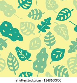 Seamless vector background green leaves. Leaves in shades of green on a yellow background. Hand drawn tropical leaves pattern. Jungle leaf. Graphic illustration for paper, web, fabric, kids, wallpaper