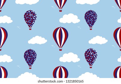 Seamless vector background with hot air balloons.