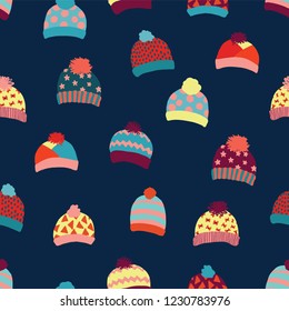Seamless vector background knitted wool hats. Warm winter clothes wear pattern. Hand drawn cozy and warm accessories. Scandinavian Winter wear. Norwegian knit fashion. For kids, fabric, paper, decor