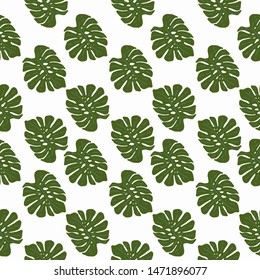 Seamless vector background with leaves of tropical plants.