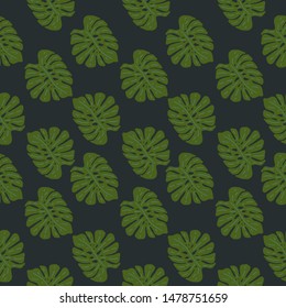 Seamless vector background with leaves of tropical plants.