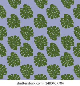 Seamless vector background with leaves of tropical plants.