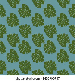 Seamless vector background with leaves of tropical plants.