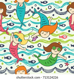 Seamless vector background with mermaids, fish, jellyfish and starfish.