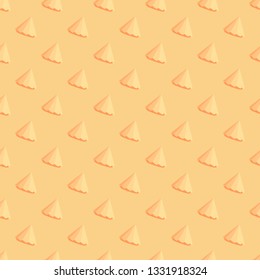 Seamless vector background with multicolored cones. Geometric pattern.