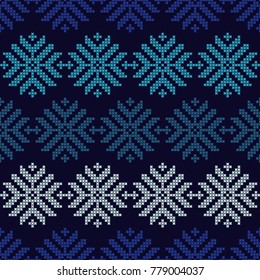 Seamless vector background with Norwegian snowflakes. Pixel snowflakes. Winter pattern. Textile rapport.