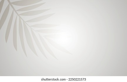 Seamless vector background of palm leaves on a gray background with a glare of rays