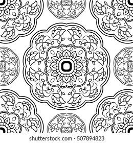 Seamless vector background. The pattern with floral simple mandalas. Oriental black and white ornament. Template for textile, molding, carpet.