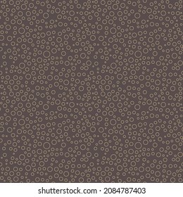 Seamless vector background with random circles. Abstract broen and golden ornament. Golden abstract pattern