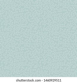 Seamless vector background with random elements. Abstract ornament. Dotted abstract pattern whith white bubles