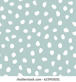 Seamless vector background with random white elements. Abstract ornament. Dotted abstract pattern