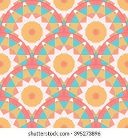 Seamless vector background. Round pattern with grid and multicolored triangles.