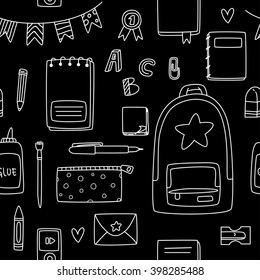 Seamless vector background with school supplies, white chalk on black board