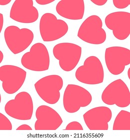Seamless vector background of small pink hearts. Vector design for the design of materials for Valentine's Day - cards, posters, covers, invitations, etc.