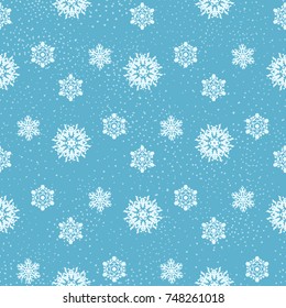 Seamless vector background with snowflakes