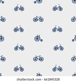 Seamless vector background with three kinds of bikes: city, circus and sport or mountain bicycle. Hand drawn. Pattern fills. Can be used for scrap-booking, paper, fabric, clothes, T-shirt, web design