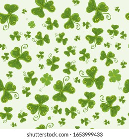 Seamless vector background with three-leaf and four-leaf clovers. find your luck