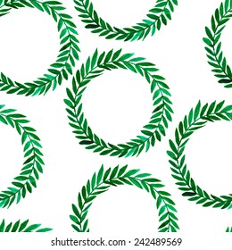 Seamless vector background with watercolor motifs. Green wreaths with leaves. Hand painted watercolor elements for design.