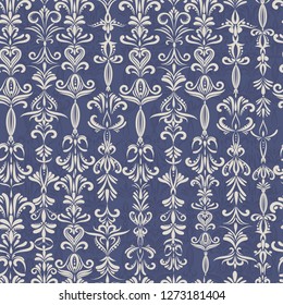 Seamless vector background with white curls on a blue background