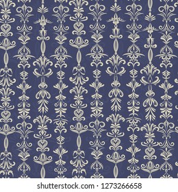Seamless vector background with white curls on a blue background