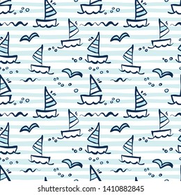 Seamless vector background with yachts, seagulls, fishes and the sea.
