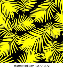 Seamless vector background with Yellow leaves of palm trees on a black background. Summer tropical design. Textile rapport.

