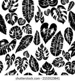 Seamless vector black tropic leaves jungle plant pattern vintage tropical exotic leaves of different types. Jungle plants. Hibiscus, monstera and palm leaves. Grunge black botanical background.