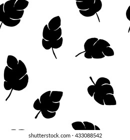 The seamless vector black and white abstract pattern with palm leaves. The creative monochrome hand drawn background for your design. Textile, blog decoration, banner, poster, wrapping paper.