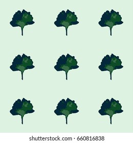 Seamless vector boho hipster pattern with Gingko Biloba leaves on a mint green background. Floral summer pattern for notebooks or children's fashion. Retro vintage trendy exotic endless background.