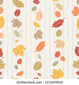 Seamless Vector Bright Autumn Falling Leaves Stripes On Shiplap Wood Plank Background. Great For Holidays, Thanksgiving, Invitations, Stationery, Greeting Cards, Fabric, Paper Crafting, & Home Decor.