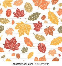 Seamless Vector Bright Colored Autumn Falling Leaves On Shiplap Wood Plank Background. Great For Holidays, Thanksgiving, Invitations, Stationery, Greeting Cards, Fabric, Paper Crafting, & Home Decor.