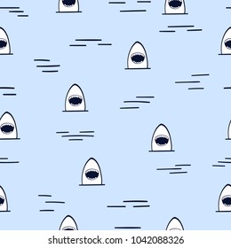 Seamless vector cartoon sharks pattern. Vector background.