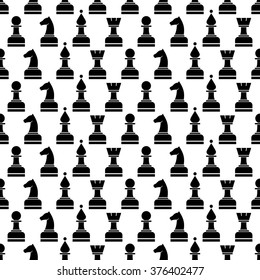 Seamless vector chaotic pattern with black chess pieces on the white background. Series of Gaming and Gambling Patterns.