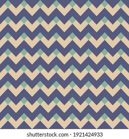 Seamless vector chevron pattern.  Geometric design with trendy zig zag chevrons. teal and cream shapes on an navy blue background. Perfect for fashion, textile design, home decor, and cute fabric.
