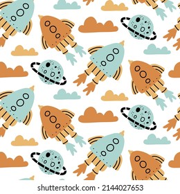 Seamless vector children's pattern with cartoon spaceships, planets on a white background. Cute baby pattern with space.