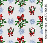 Seamless vector Christmas pattern featuring mistletoe sprigs adorned with red bows, candy canes with greenery, and delicate snowflakes on a light gray background, creating a festive and cheerful de...