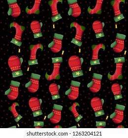 Seamless vector Christmas pattern. Red mittens and Christmas socks on black background. All elements are isolated.