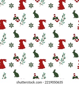 Seamless vector christmas pattern with snowflake elements, hare silhouette, ostrich branches, christmas candy. Design for printing on fabric and paper.