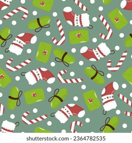 Seamless vector Christmas pattern with sugar cane, envelope, gift box and Christmas sock. In a hand-drawn style on a green background. Stock illustration