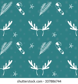 Seamless vector Christmas texture. Seamless backdrop with pine tree, candy cane, deer horns and snowflakes. Simple style pattern background with Christmas decoration elements.